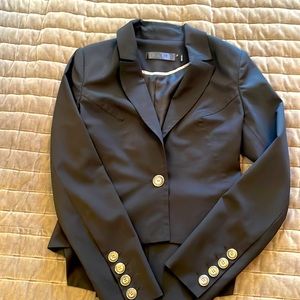 LAMB black blazer with adorable asymmetrical back. Size 6